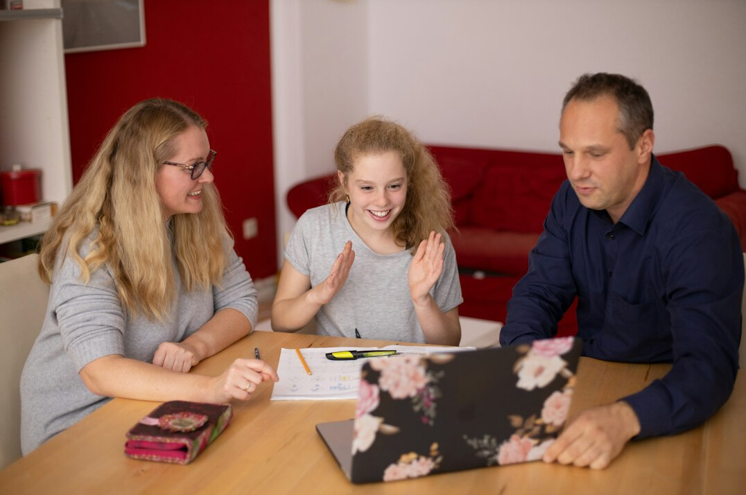 family reviewing expenses