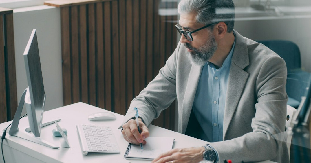 stock market trader analyzing charts